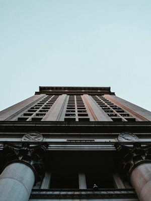 low angle photography of gray concrete building